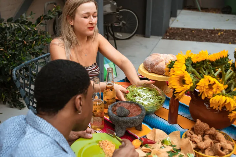 Bring a Dish, Leave with a Family: Why the Potluck Is America's Most Underrated Wellness Practice